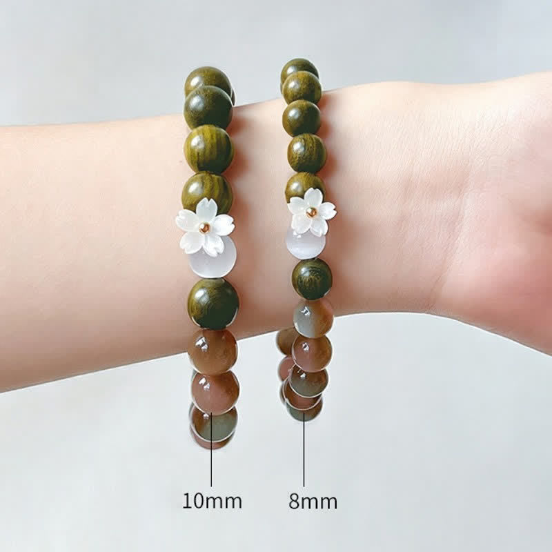 Buddha Stones Bracciale Serenity con ciondolo a forma di fiore occhio di gatto in legno di sandalo verde. - image 10