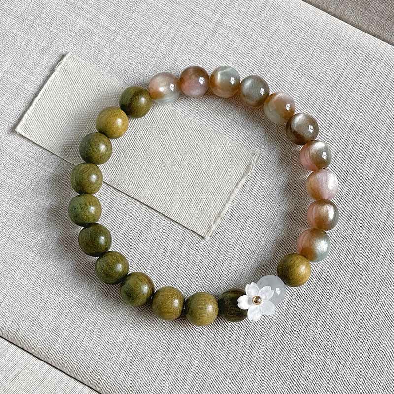 Buddha Stones Bracciale Serenity con ciondolo a forma di fiore occhio di gatto in legno di sandalo verde. - Perline rosa da 8 mm - image 0