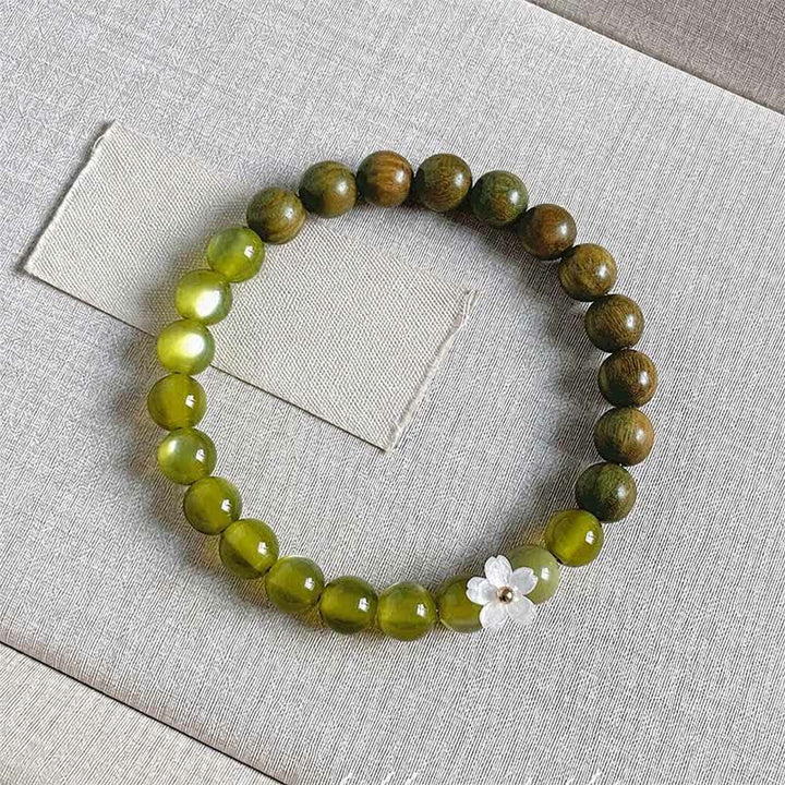 Buddha Stones Bracciale Serenity con ciondolo a forma di fiore occhio di gatto in legno di sandalo verde. - Pietra occhio di gatto da 8 mm - image 13