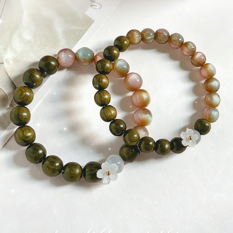 Buddha Stones Bracciale Serenity con ciondolo a forma di fiore occhio di gatto in legno di sandalo verde. - image 11