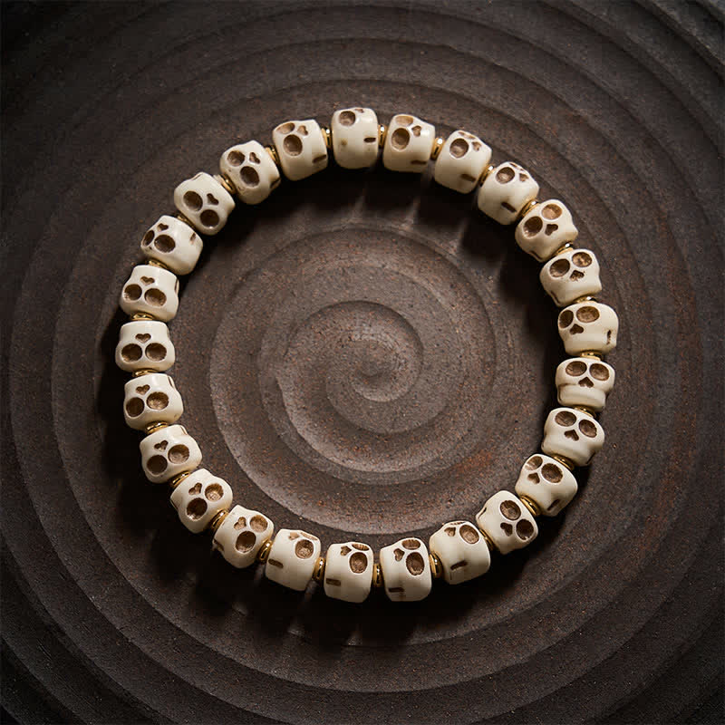 Buddha Stones Braccialetto con perline d'osso tibetane, motivo "Signore dei Cadaveri" e teschio della foresta, per protezione e coraggio. - image 1