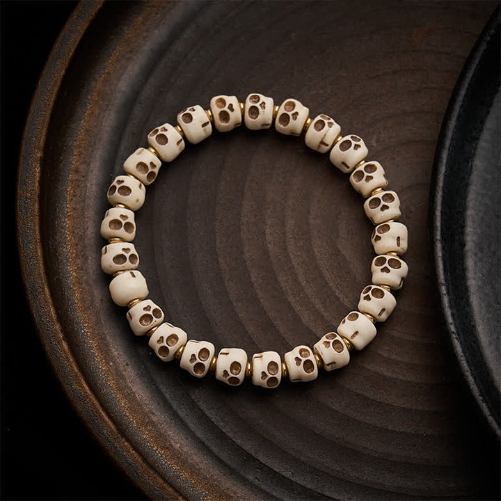 Buddha Stones Braccialetto con perline d'osso tibetane, motivo "Signore dei Cadaveri" e teschio della foresta, per protezione e coraggio. - 9 × 6,3 mm - image 0
