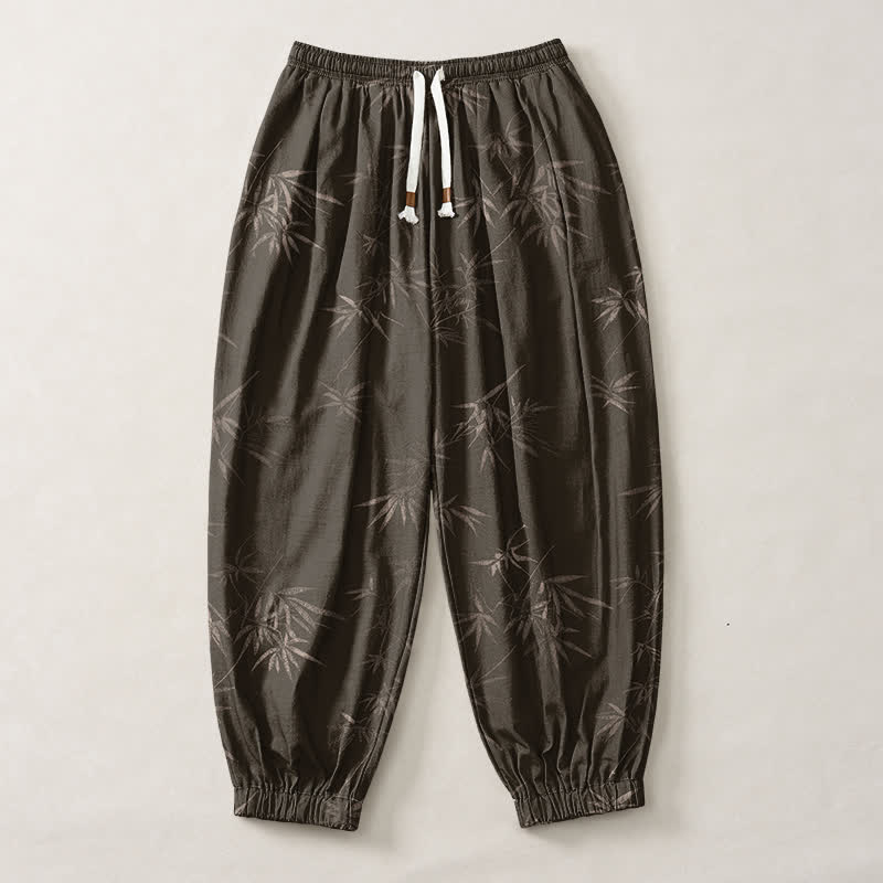Buddha Stones Pantaloni harem da uomo in puro cotone con coulisse e tasche, fantasia a foglie di bambù. - image 1