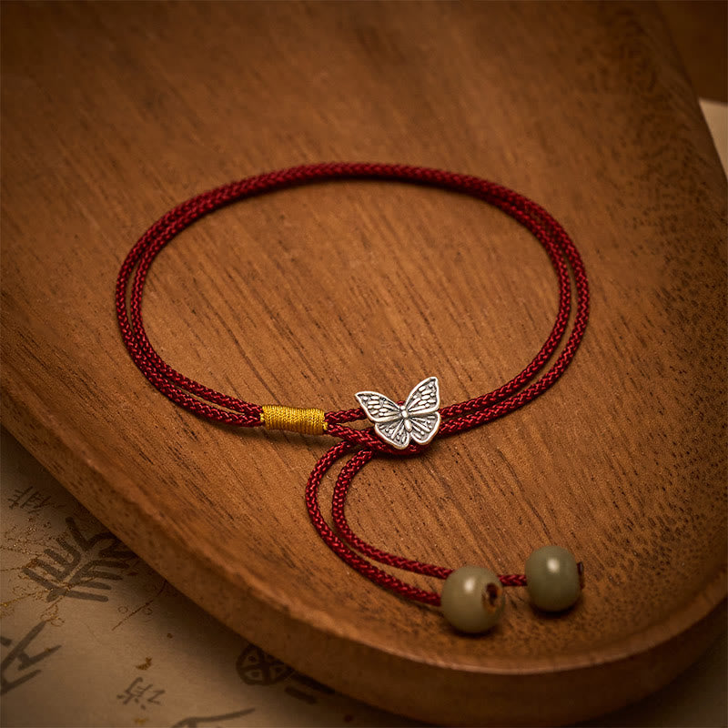 Buddha Stones Bracciale vintage in argento sterling 925 con farfalla protettiva e cordino rosso intrecciato. - image 1