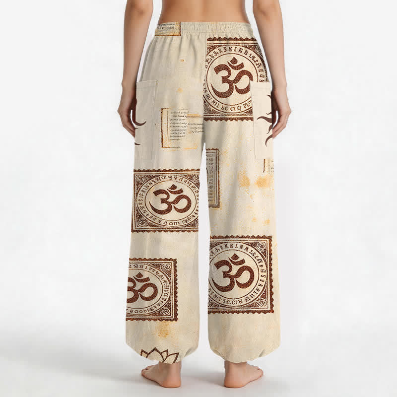 Buddha Stones Pantaloni harem da donna in cotone vintage con motivo Om e sole, vita elasticizzata e tasche laterali. - image 2
