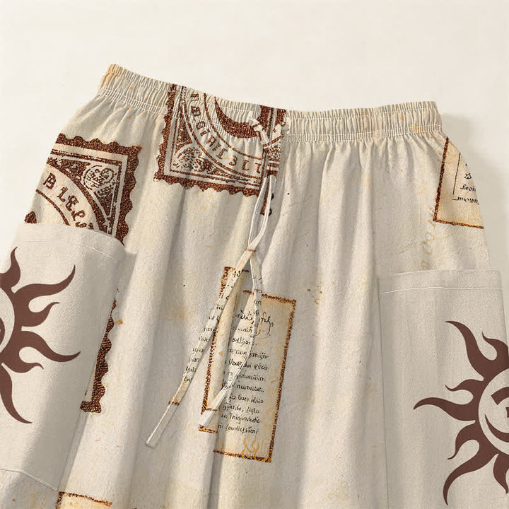 Buddha Stones Pantaloni harem da donna in cotone vintage con motivo Om e sole, vita elasticizzata e tasche laterali. - image 5