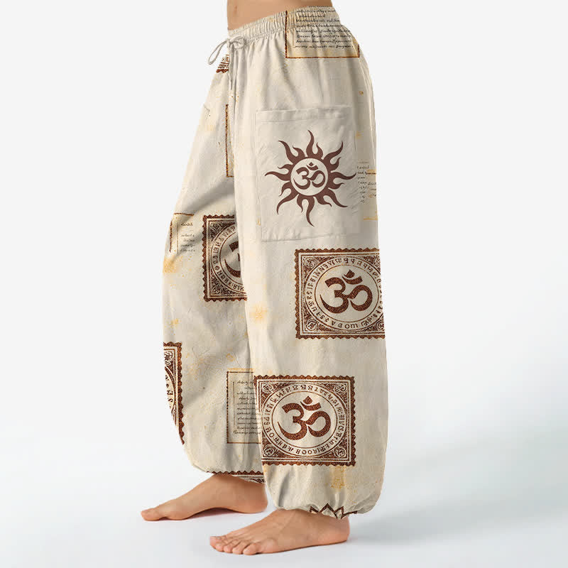 Buddha Stones Pantaloni harem da donna in cotone vintage con motivo Om e sole, vita elasticizzata e tasche laterali. - image 1