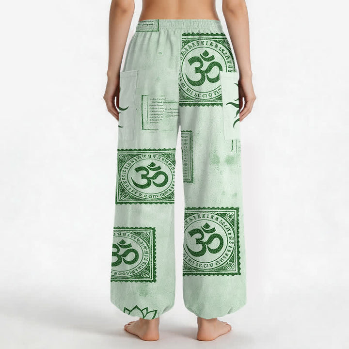 Buddha Stones Pantaloni harem da donna in cotone vintage con motivo Om e sole, vita elasticizzata e tasche laterali. - image 12