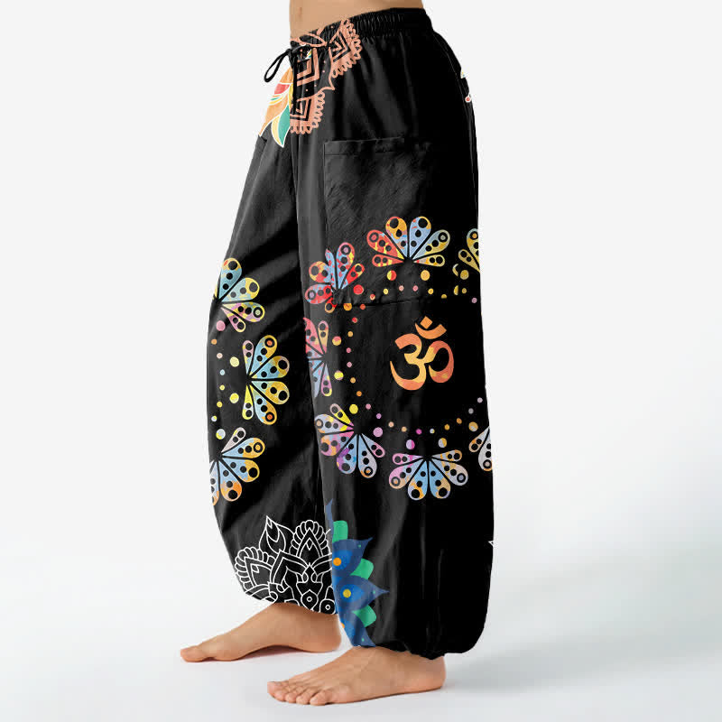 Buddha Stones Pantaloni harem da donna in cotone con elastico in vita e motivo mandala loto OM, con tasche laterali. - image 1