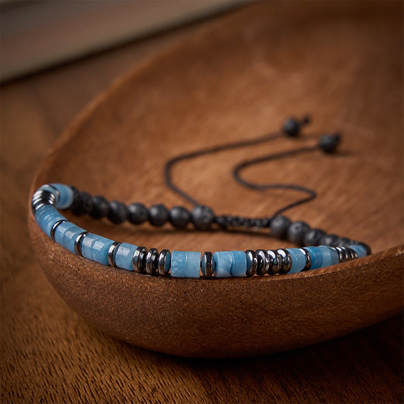 Buddha Stones Bracciale in pietra lavica color acquamarina con dettagli argentati. - image 1