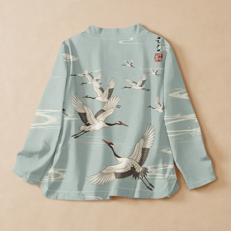 Buddha Stones Camicia da donna a maniche lunghe con scollo a V e allacciatura, in stile Hanfu, con stampa gru volanti e motivo a onde d'acqua. - image 1