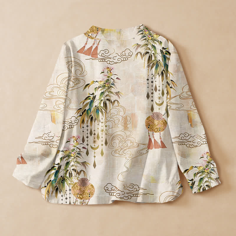 Kimono da donna a maniche lunghe con scollo a V e allacciatura, in cotone con stampa di foglie e nuvole e motivo Buddha Stones. - image 1