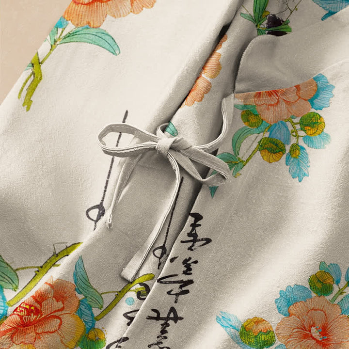 Kimono da donna a maniche lunghe con scollo a V e allacciatura, in cotone con stampa floreale e calligrafia ispirata Buddha Stones. - image 3
