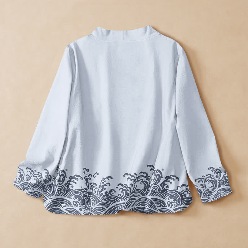 Kimono da donna a maniche lunghe con scollo a V e allacciatura, in cotone con stampa Buddha Stones e onde oceaniche. - image 1