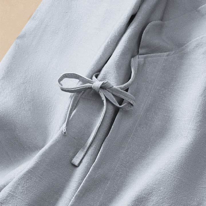 Kimono da donna a maniche lunghe con scollo a V e allacciatura, in cotone con stampa Buddha Stones e onde oceaniche. - image 3