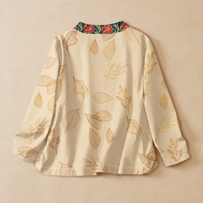 Buddha Stones Camicia da donna a maniche lunghe, stile Hanfu, con scollo a V e allacciatura, in cotone, con stampa di foglie dorate e fiori rossi. - image 1