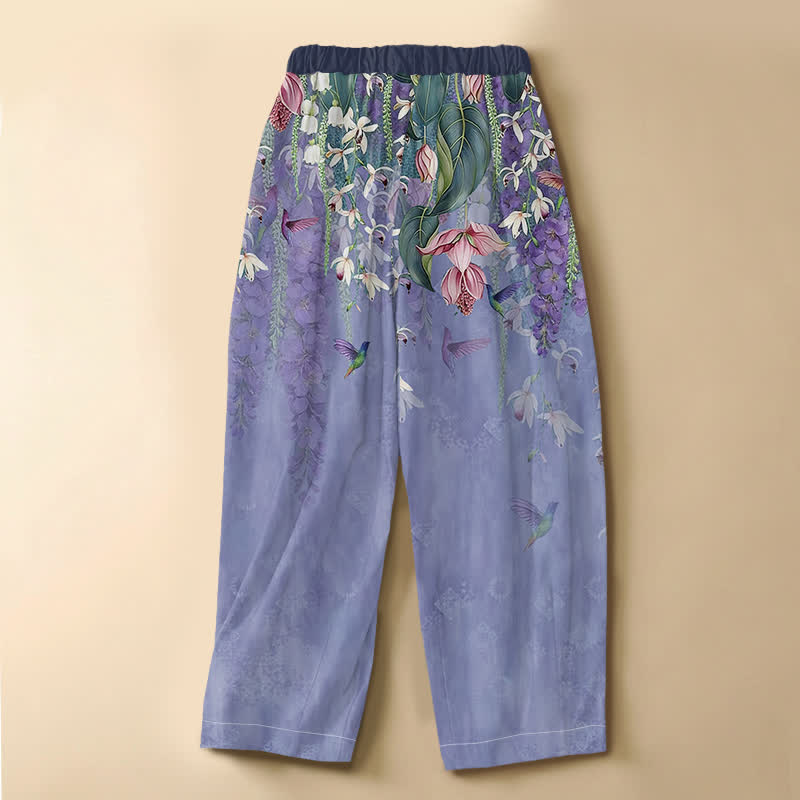 Buddha Stones Pantaloni harem da donna in puro cotone con motivo floreale ad acquerello e colibrì, bottoni a rana e vita elasticizzata con tasche. - image 1