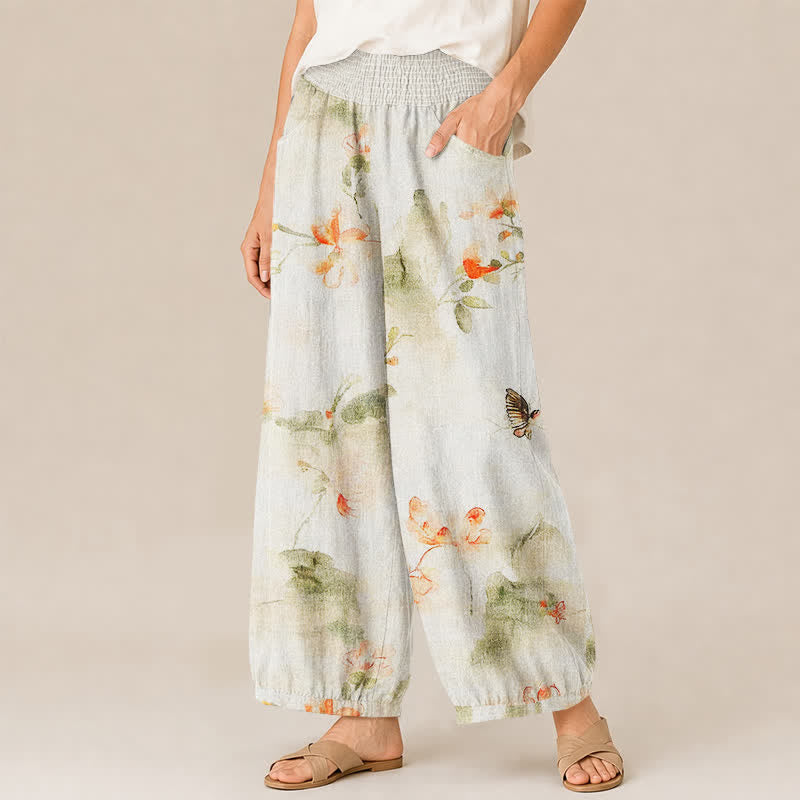 Buddha Stones Pantaloni harem da donna in cotone con stampa floreale ad acquerello e farfalle, plissettati e vita elasticizzata, con tasche. - image 1