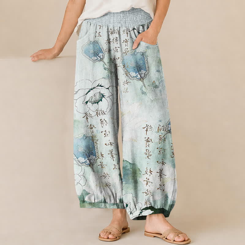 Buddha Stones Pantaloni harem da donna in cotone con motivo floreale acquerellato e calligrafia, vita elasticizzata e pieghe, con tasche. - Turchese pallido - US16, UK/AU20, EU48 (3XL) - image 0