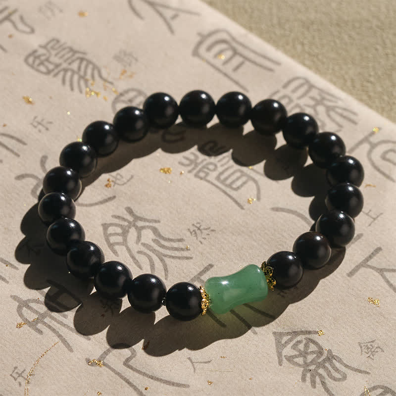 Buddha Stones Bracciale unisex in legno di ebano, sandalo verde con venature naturali. - image 1