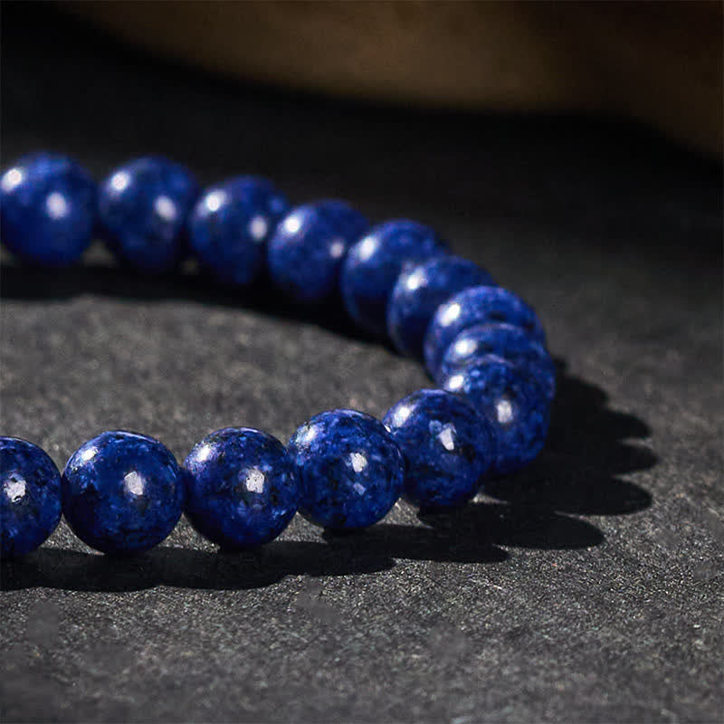 Buddha Stones Bracciale minimalista elastico con perline di lapislazzuli e simbolo di saggezza. - image 4