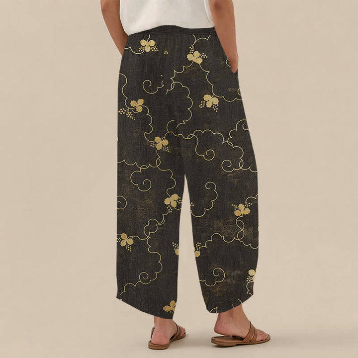 Buddha Stones Pantaloni harem da donna in cotone stile vintage con motivo floreale e nuvole, plissettati e vita elasticizzata, con tasche. - image 1