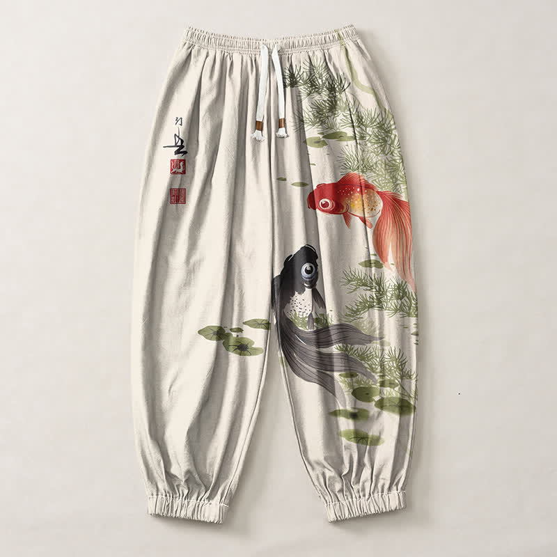 Buddha Stones Pantaloni harem da uomo in puro cotone con coulisse e tasche, fantasia a foglie di loto e koi. - image 1