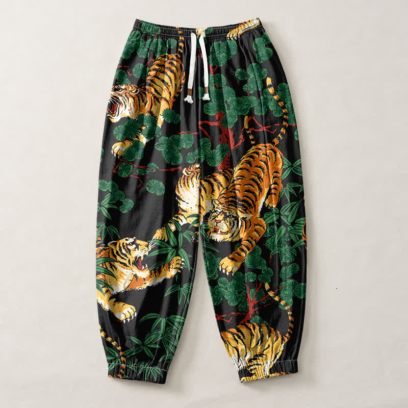 Buddha Stones Pantaloni harem da uomo in puro cotone con coulisse e tasche, fantasia a foglie tropicali e tigre. - image 1