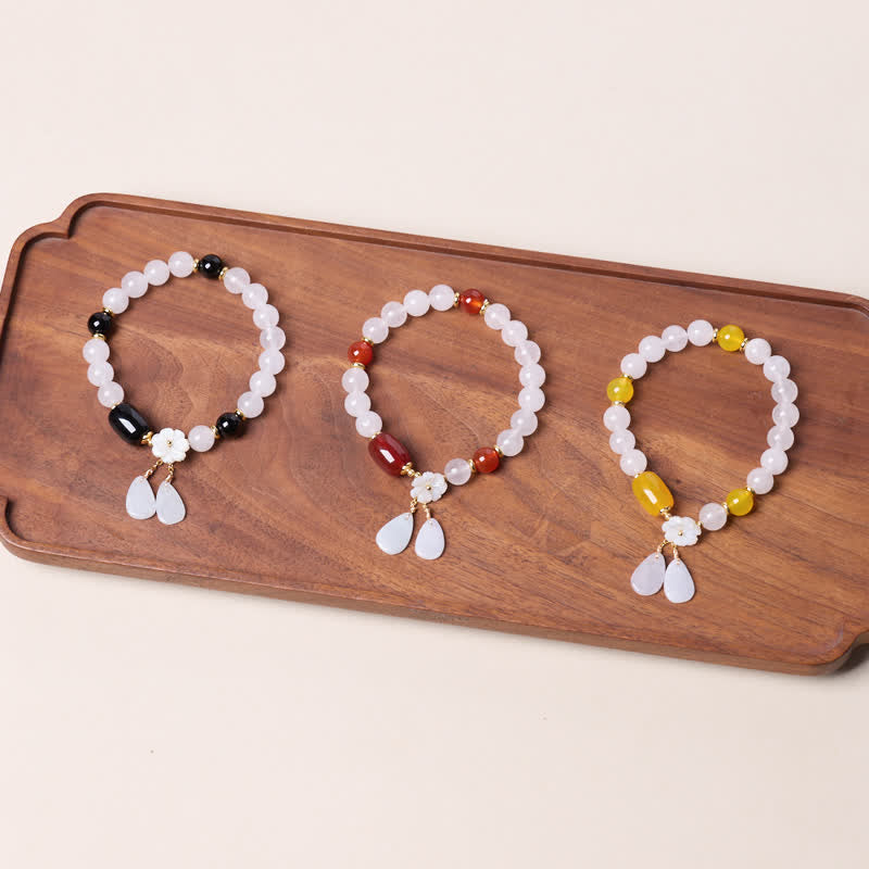 Buddha Stones Elegante bracciale a goccia con motivo floreale in calcedonio bianco e agata nera - image 13