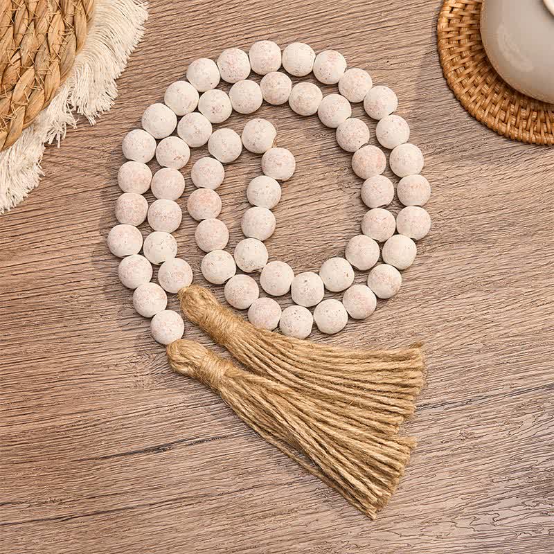 Buddha Stones Decorazione da appendere con doppia nappa e texture effetto legno screziato, stile Mindful Living. - Legna - image 0