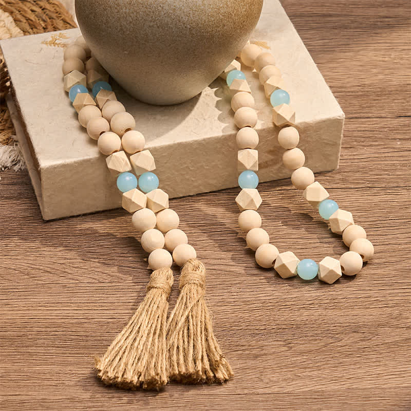 Buddha Stones Decorazione da appendere con perline di legno sfaccettate e doppia nappa, stile Mindful Living. - image 1