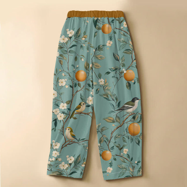 Buddha Stones Pantaloni harem da donna in puro cotone con motivo floreale e uccelli da frutteto, bottoni a rana e vita elasticizzata, con tasche. - image 1