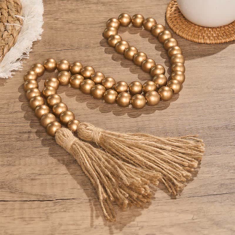 Buddha Stones Ghirlanda di perline di legno rustiche dorate con nappe - Mindful Living Decor - image 1