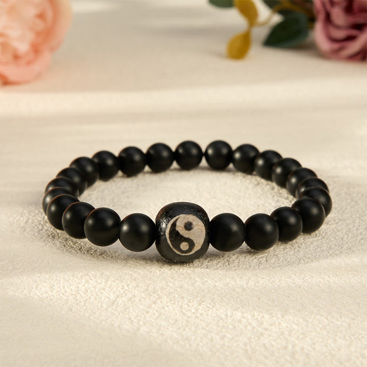 Buddha Stones Bracciale rotondo con perline in onice nera, turchese bianco e simbolo Yin Yang, equilibrio Yin Yang. - Onice Nero - 5,9–6,3 pollici (15–16 cm) - image 16