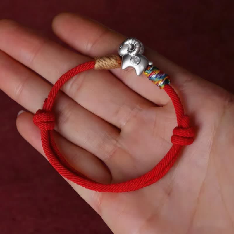 Buddha Stones Bracciale protettivo con cordino rosso a forma di pecora in argento sterling 999, anno della capra - image 1