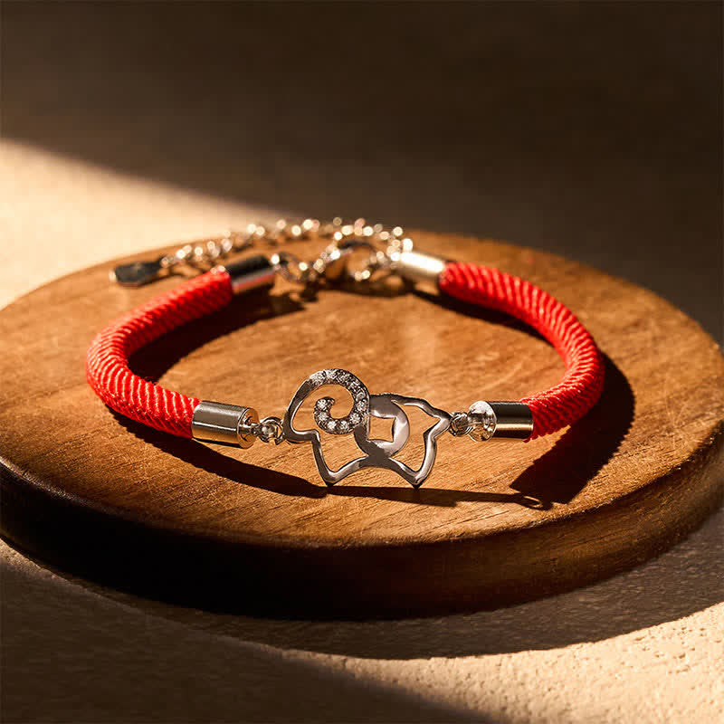 Buddha Stones Braccialetto con ciondolo a forma di capra e cordino rosso intrecciato, simbolo zodiacale, per rafforzare la forza. - image 1