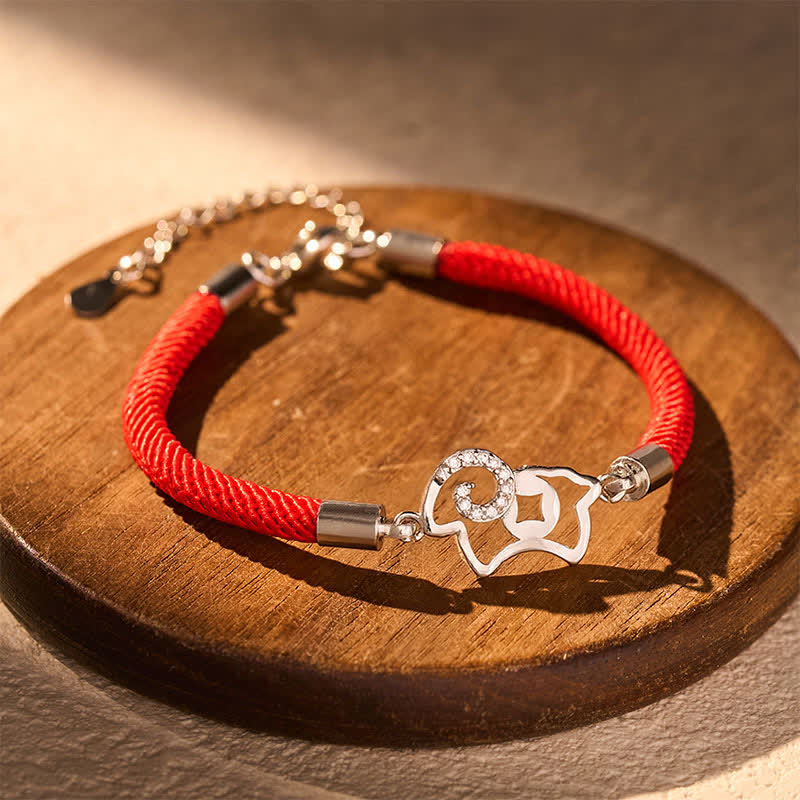 Buddha Stones Braccialetto con ciondolo a forma di capra e cordino rosso intrecciato, simbolo zodiacale, per rafforzare la forza. - Filo Rosso (Protezione ♥ Fortuna) - image 0