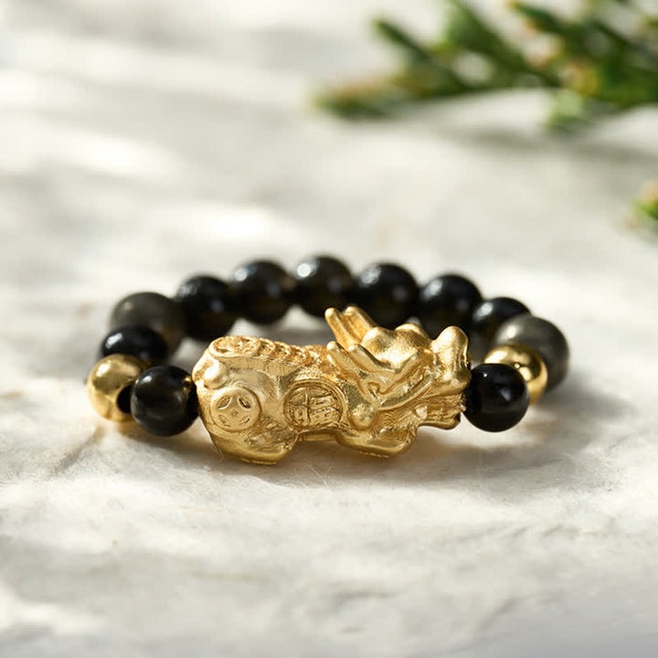 Buddha Stones Anello mini elasticizzato con perline in ossidiana nera, pirite, ematite, rame Pi Xiu per ricchezza ed energia - image 1