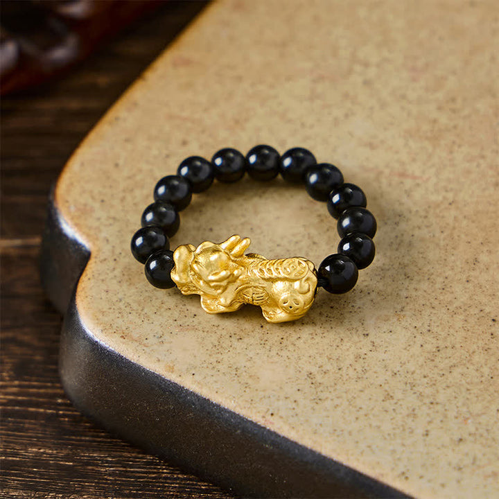 Buddha Stones Anello mini elasticizzato Pi Xiu in rame e ossidiana nera per forza ed energia - image 11