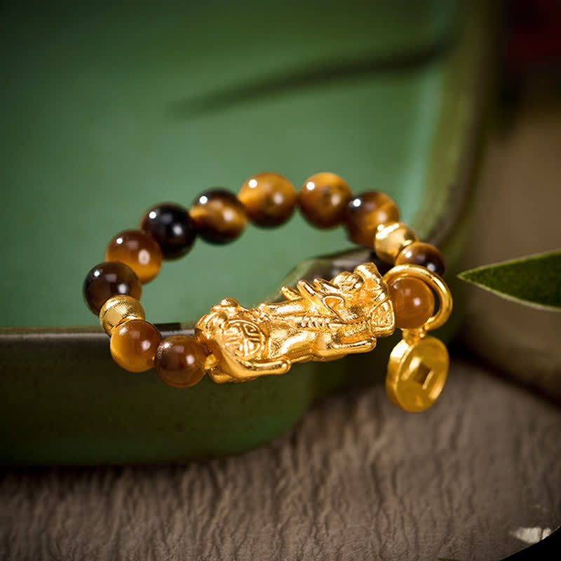 Buddha Stones Mini anello elastico con perline a forma di moneta cinese Tiger Eye Pi Xiu Wealth. - Corrisponde alle taglie americane 6-8 (52-55 mm) - image 0