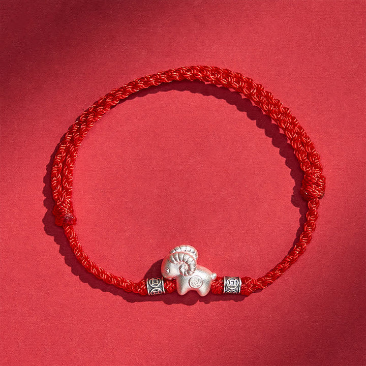 Buddha Stones Bracciale di forza con corda di pecora in argento sterling 999, anno della capra - image 1