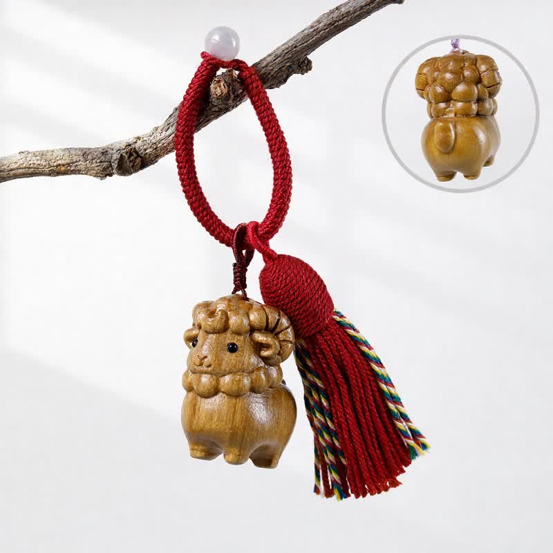 Buddha Stones Portachiavi con nappa portafortuna a forma di capra, intagliati a mano in legno di sandalo verde, eucalipto arcobaleno e legno di sandalo verde. - Sandalo verde - Rosso - image 0
