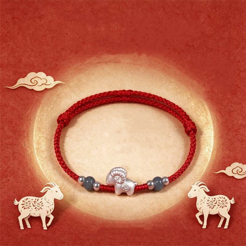 Buddha Stones Braccialetto con cordino rosso, anno della capra, in argento sterling 999, intrecciato a mano, con simbolo zodiacale cinese della capra e filo rosso. - image 1