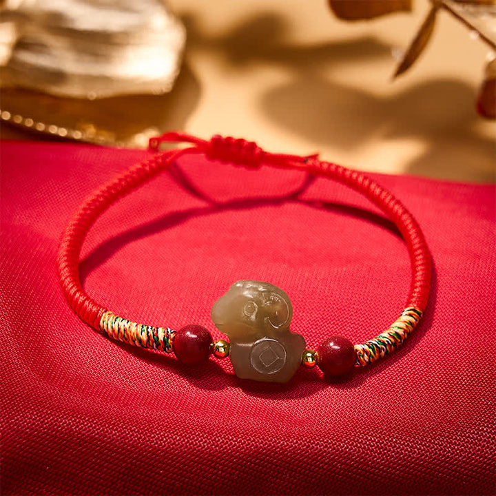Buddha Stones Braccialetto intrecciato con ciondolo a forma di capra in giada Hetian e protezione in cinabro, anno della capra. - image 1