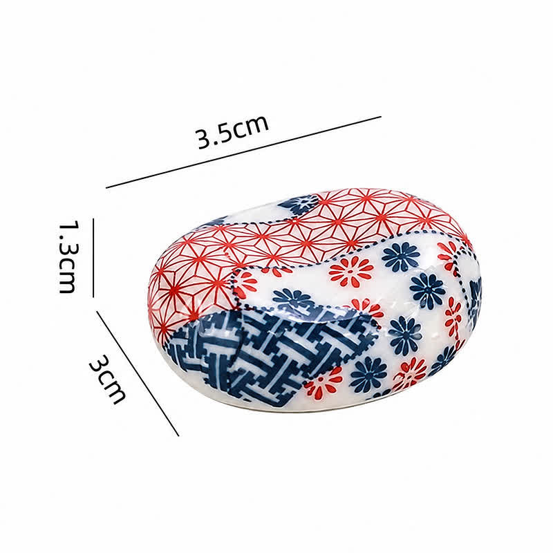 Buddha Stones Porta bacchette ovale in ceramica con motivo floreale per fave - Motivo floreale. Dimensioni approssimative: 3,5 × 3,0 × 1,3 cm. - Ceramica - image 1