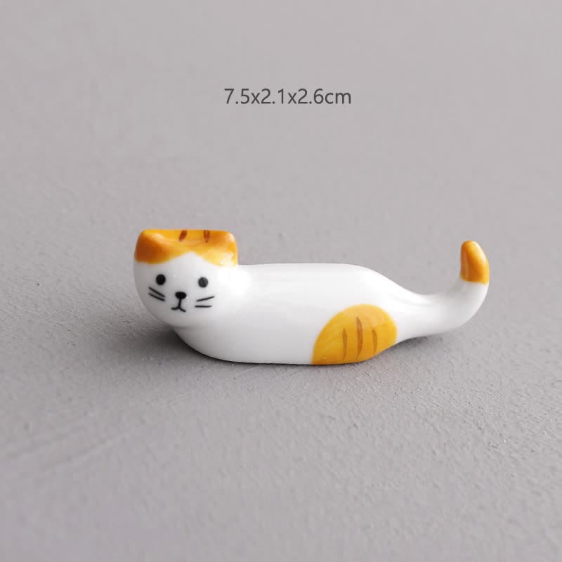 Buddha Stones Porta bacchette in ceramica con simpatico design a gatto - Gatto dalle orecchie gialle e dalla coda arricciata, circa 7,5 × 2,1 × 2,6 cm - Ceramica - image 1