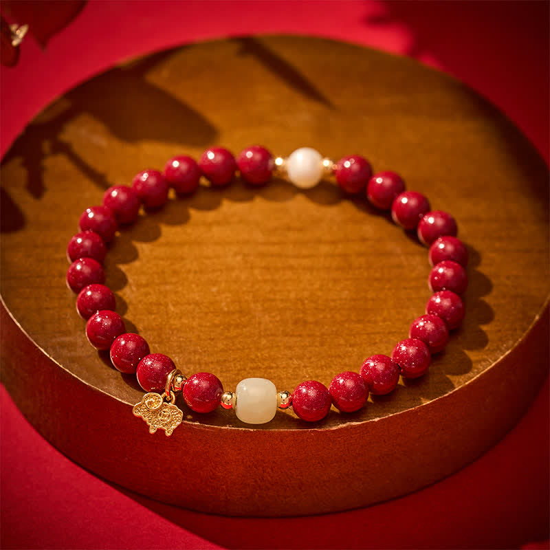 Buddha Stones Bracciale protettivo con ciondolo a forma di capra in giada e perla color cinabro, perla e capra. - image 1