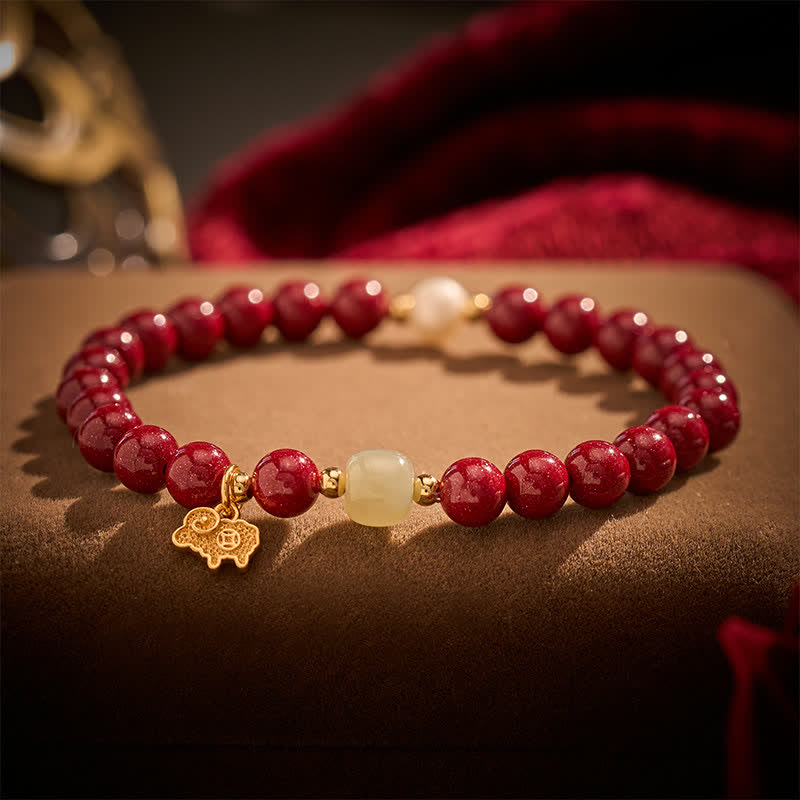 Buddha Stones Bracciale protettivo con ciondolo a forma di capra in giada e perla color cinabro, perla e capra. - Cinabro (Calma ♥ Concentrazione) - image 0