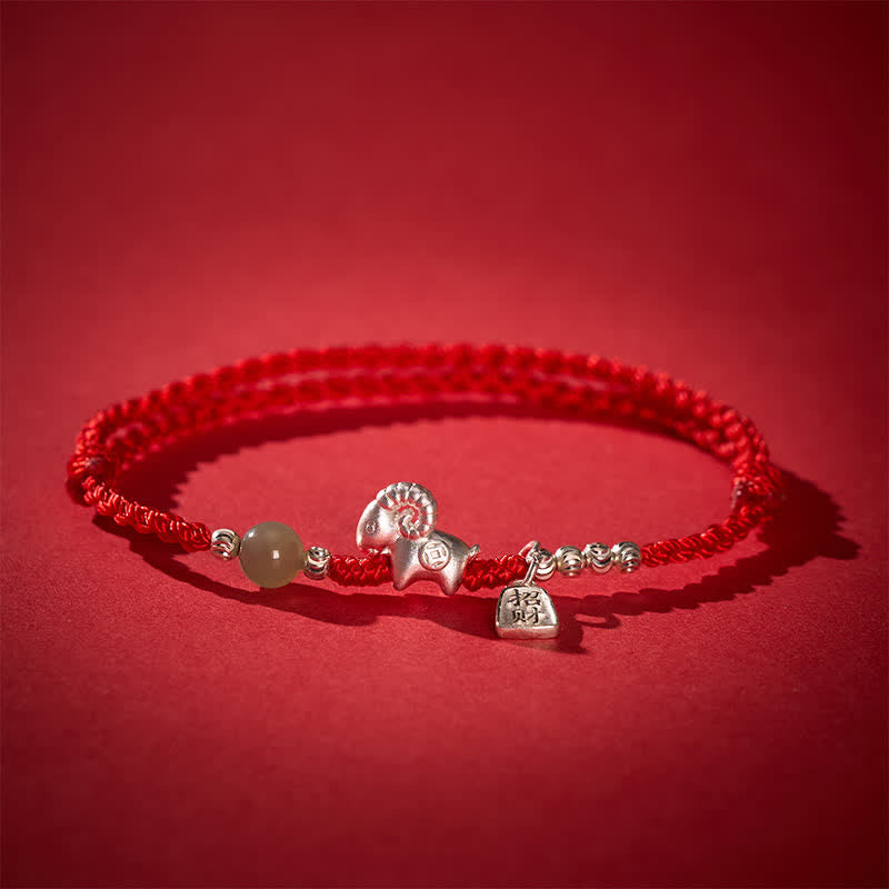 Buddha Stones Braccialetto portafortuna dell'anno della capra in argento sterling 999 con cordino rosso - Capra - image 0