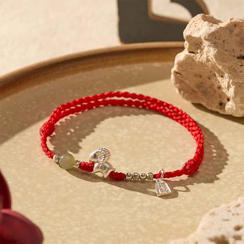 Buddha Stones Braccialetto portafortuna dell'anno della capra in argento sterling 999 con cordino rosso - image 1